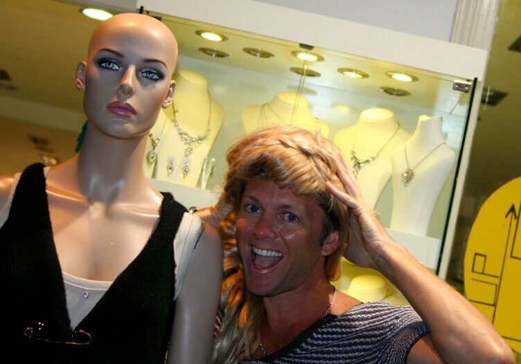 Smiling man with mannequin display