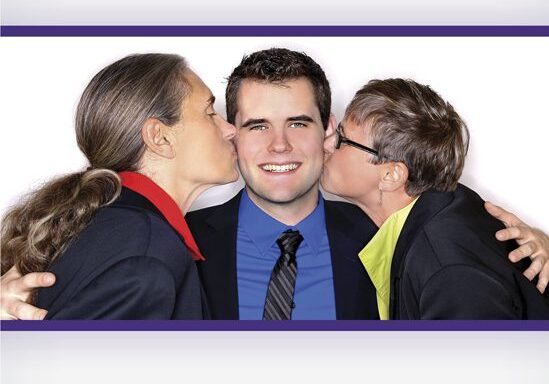Two women kissing man's cheeks