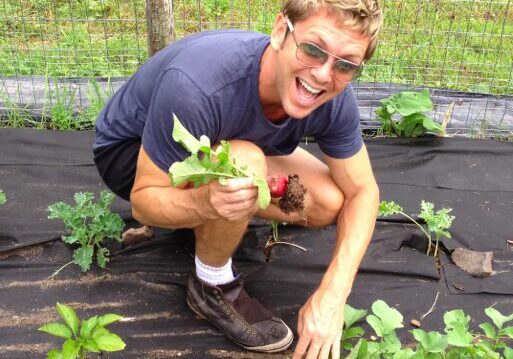 Man gardening with enthusiasm outdoors