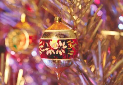 Colorful ornament on Christmas tree branch
