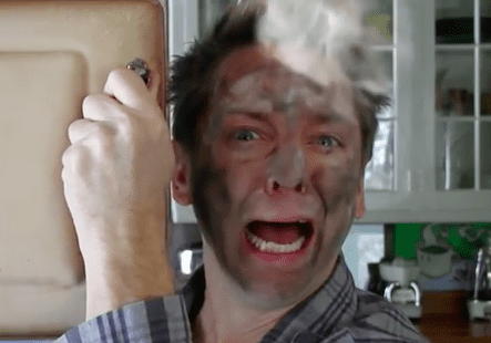 Surprised man with smoke on face