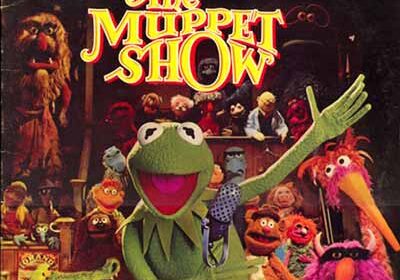 Muppet characters performing on stage