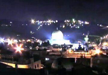 Night view of city lights and dome