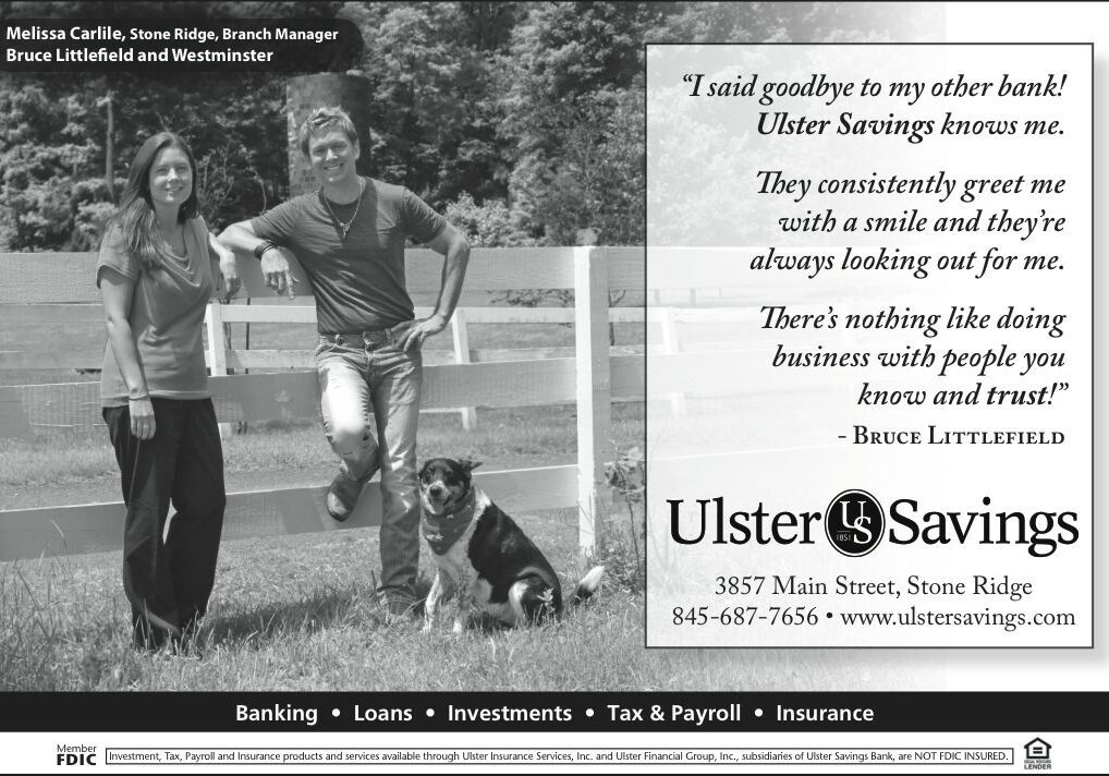 Branch manager with customer and dog outdoors.