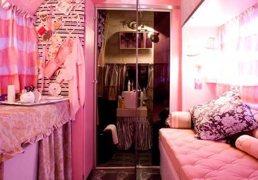 Cozy pink room with patterned curtains