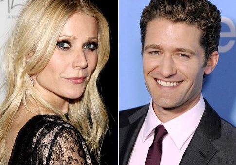 Blonde woman and smiling man in suits