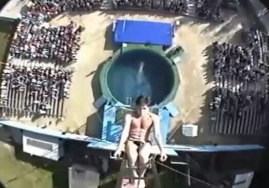 Diver above circular pool