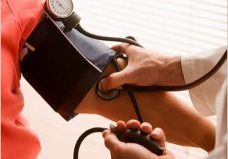 Doctor measuring blood pressure