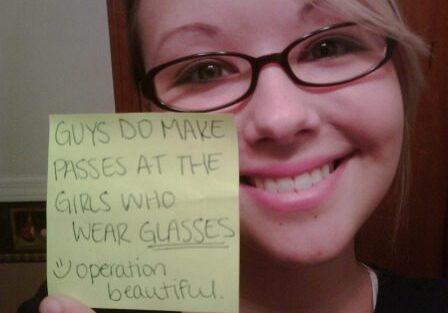 Woman with glasses and motivational message