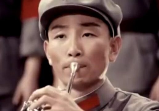 Man with horn wearing a cap