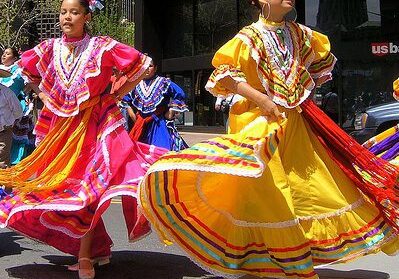 Festive street dance with colorful costumes