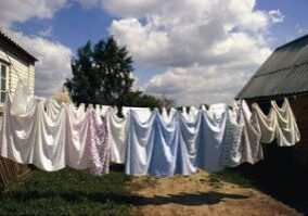 Laundry hanging under blue sky