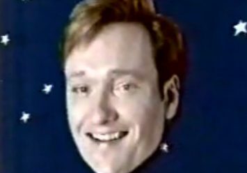 Smiling face surrounded by stars
