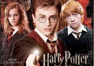 Young wizards in school uniforms and cloaks