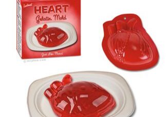 Red heart jelly mold on plate