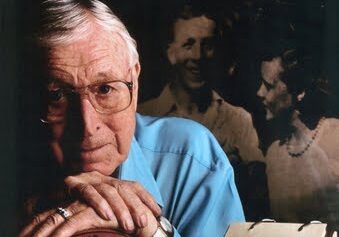 Elderly man with basketball and book