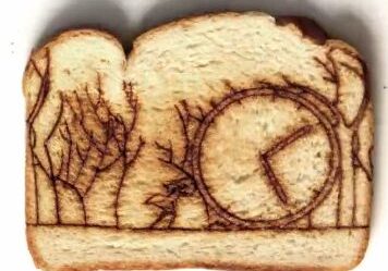 Forest scene engraved on toasted slice