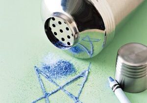 Blue star drawn with glitter shaker