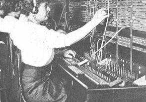 Historic switchboard operator in action