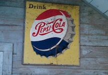 Old-fashioned Pepsi-Cola logo display