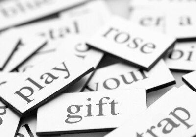 Word magnets scattered on a surface