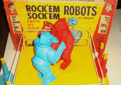 Colorful boxing robots in toy ring
