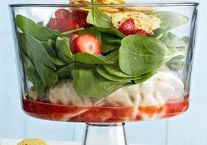 Layered salad with chips and spinach