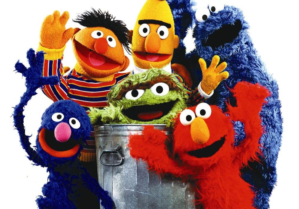 Colorful puppets posing together happily