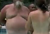 People in a pool, back view