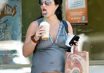 Stylish woman with sunglasses enjoying coffee