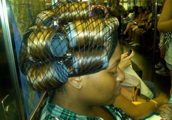 Commuter with hair rollers sleeping