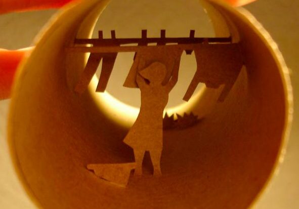 Shadow art inside a cardboard cylinder