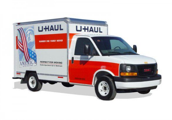 Red and white U-Haul rental truck