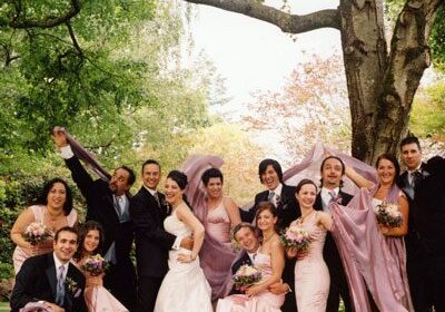 Group celebrating outdoors in formal attire