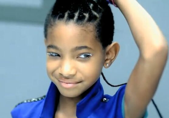 Girl in blue jacket smiling