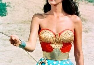 Woman in superhero costume with lasso